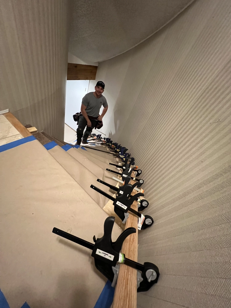 James working on a handrail